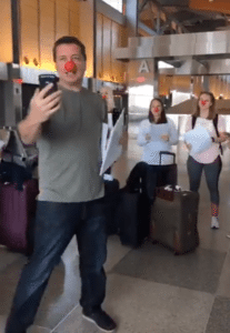 Our fearless leader donned a red nose to tell us all that we were headed to … Paris!